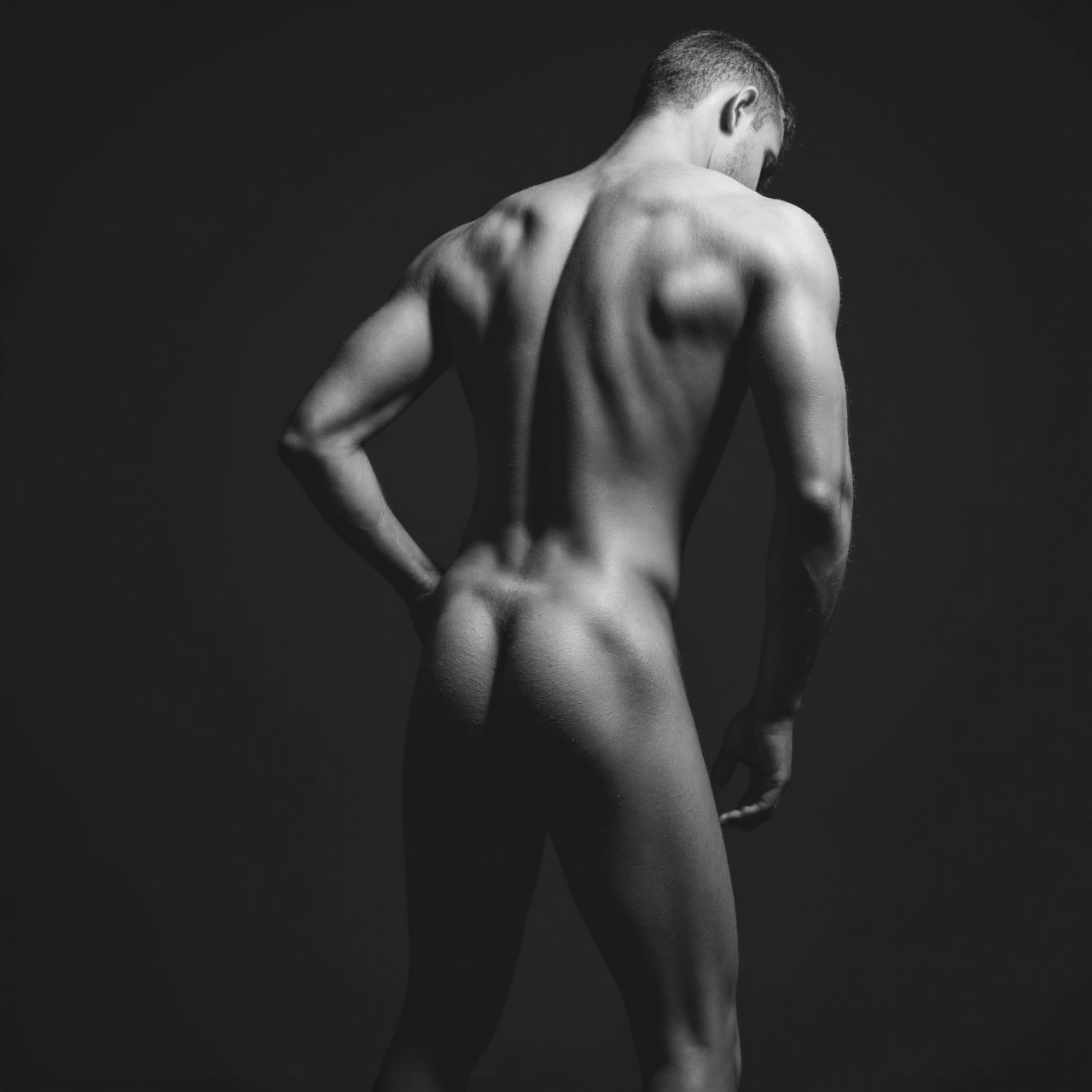 Backside of a man with his back turned
